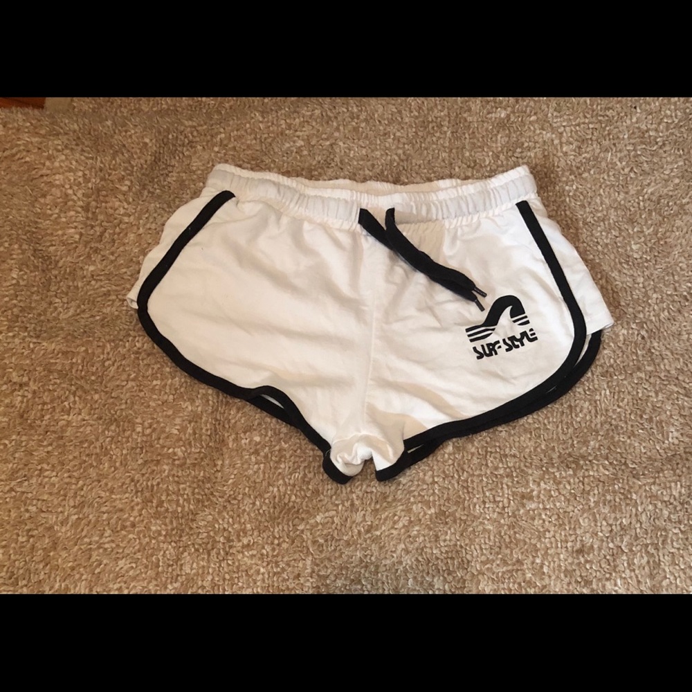 White surf style shorts